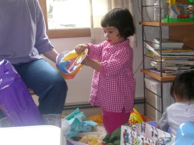 Mia opening a gift