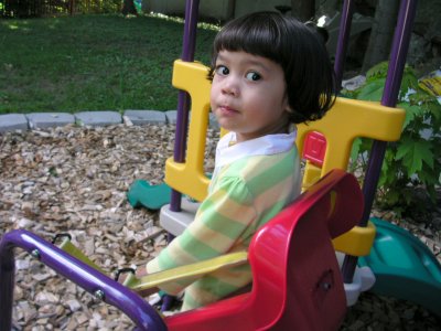 Mia about to ride the swing