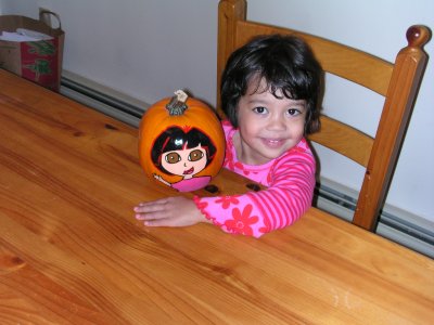 Mia with a Dora pumpkin