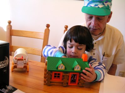 Mia with Grandpop and Lincoln Logs