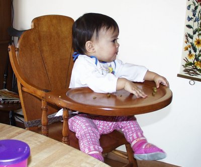 Mia in the heirloom high chair