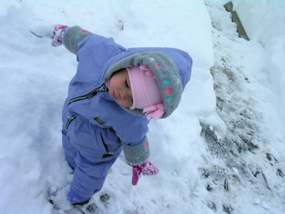 Mia near a snow bank